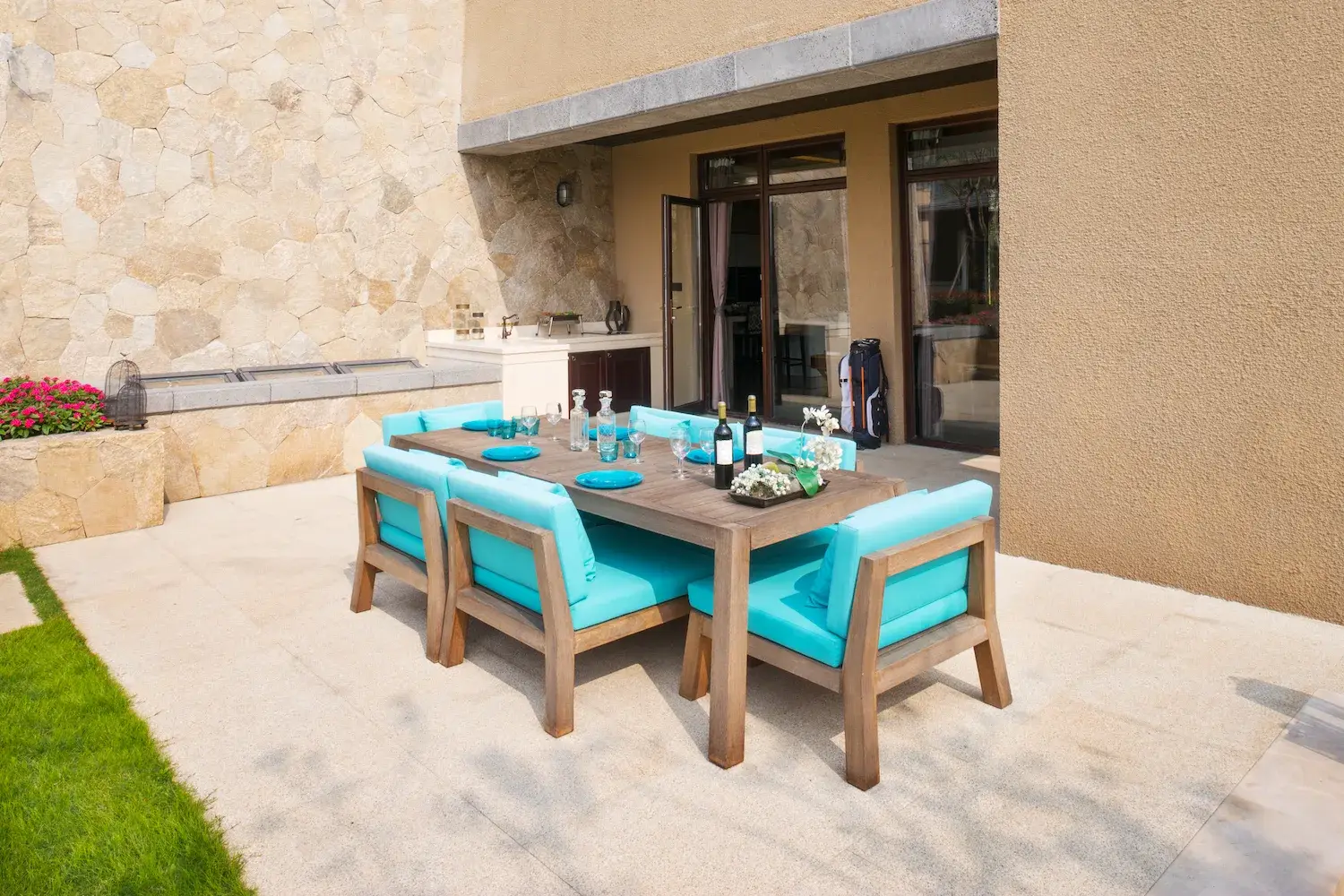 Concrete patio with outdoor dining furniture